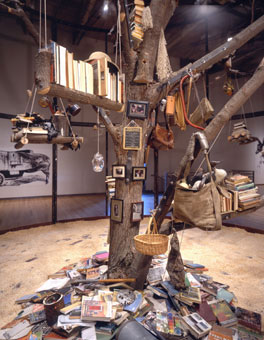 Mark Dion, <i>Library for the Birds of Massachusetts</i>, 2005. Steel, maple tree, plywoood, books, and mixed media, 20 x 18 x 20 feet. Installation view: Becoming Animal, at MASS MoCA, North Adams, MA.