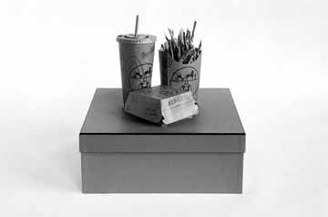  Tom Sachs, Hermès Valuemeal, 1998, hot glue, ink and paper, 18×12 x 12". Courtesy of Tom Sachs Studio.