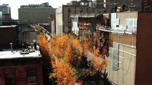 Installation of El Anatsui’s “Broken Bridge II” (2012) above the High Line in New York City. Production still from the series Exclusive. © Art21, Inc. 2013. Cinematography by Ian Forster.