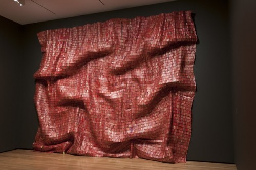 El Anatsui, "Red Block," 2010. Aluminum and copper wire, Two pieces, each 200 3/4 x 131 1/2 in. Courtesy of the Broad Art Foundation. 