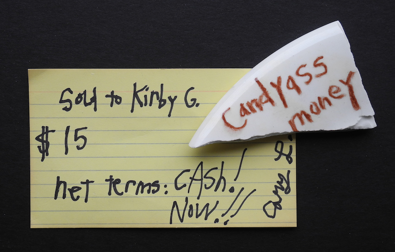Cary Leibowitz/Candyass. "Candyass Money" (with receipt), 1994. Glazed ceramic; approx. 2 x 3 inches. Courtesy Kirby Gookin.