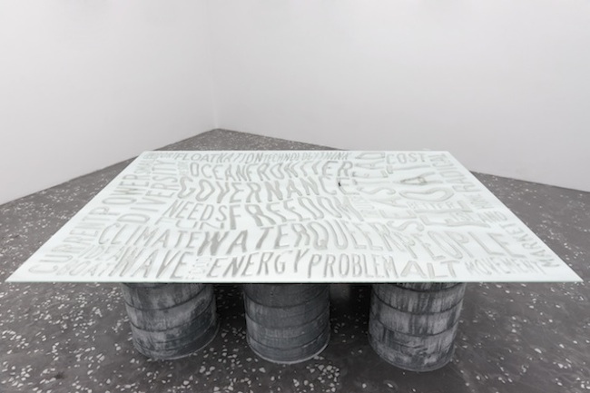 Daniel Keller. Zion + Platform (Seasteading Tag Cloud), 2013; mirrored glass, hydrophobic coating, distilled water, steel. Courtesy of Krauper-Tuskany Zeidler, Berlin, and New Galerie, Paris.