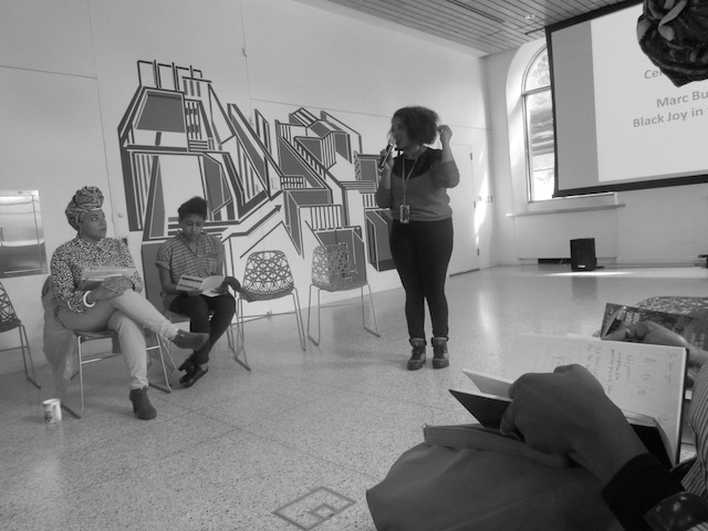 Damali Abrams, 2015. The poet LaTasha N. Nevada Diggs and the artist Shani Peters look on as Suhaly Bautista-Carolina from Creative Time introduces the “Black Joy Salon” at El Museo del Barrio, based on themes in Marc Bamuthi Joseph’s work, Black Joy in the Hour of Chaos. Courtesy Damali Abrams. © Damali Abrams