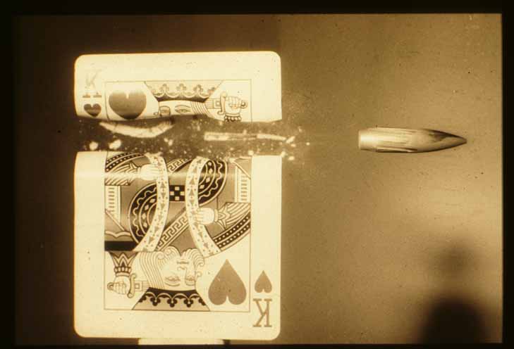 Harold Edgerton. Bullet Through King of Hearts, ca. 1964. Vintage gelatin silver print. Source: The Edgerton Digital Collections (EDC) Project. Courtesy of MIT Museum.