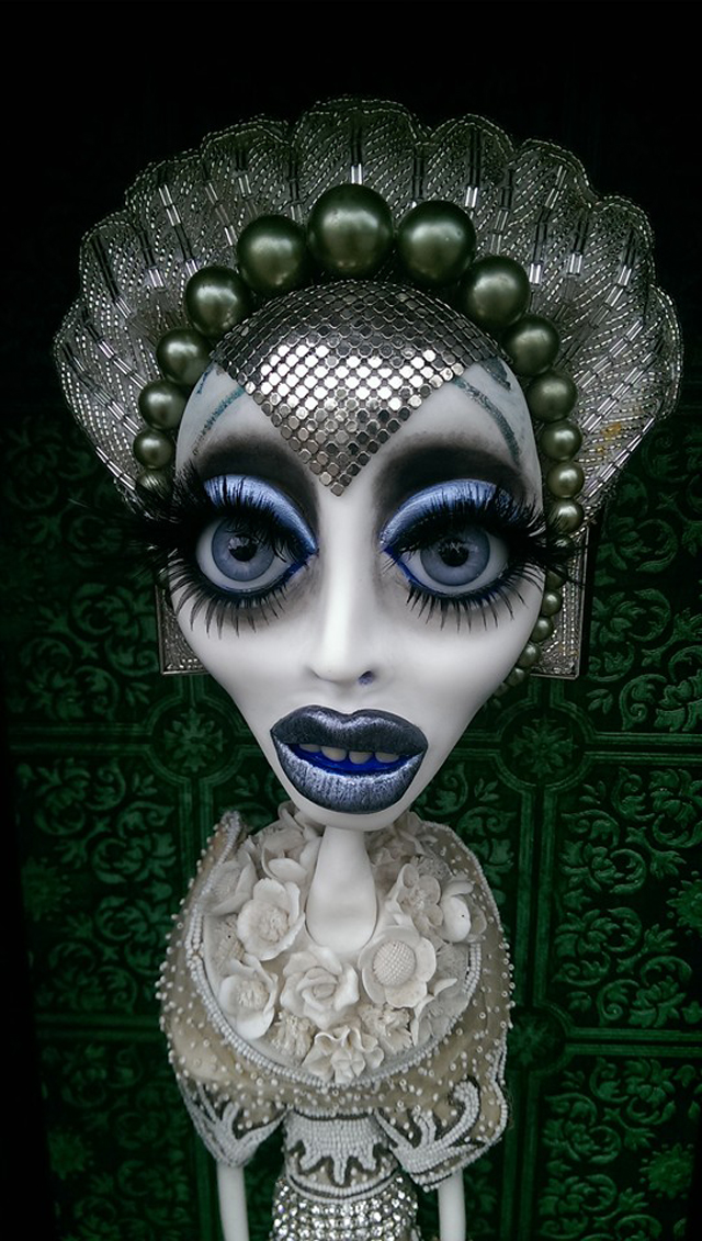 Vinsantos. SHE LIVES ALONE, detail, 2016. Polymer clay, cosmetics, quartz crystal, vintage and antique jewelry and accessories, 16" x 46". Courtesy of the artist. 