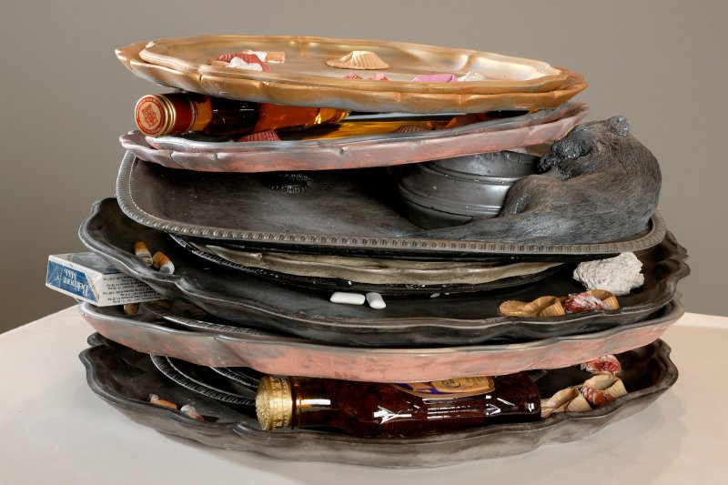 Liz Magor. Stack of Trays, 2008. Polymerized gypsum, chewing gum, found objects, 25 x 45 x 47 cm. Private collection, Calgary. Photo: Scott Massey.