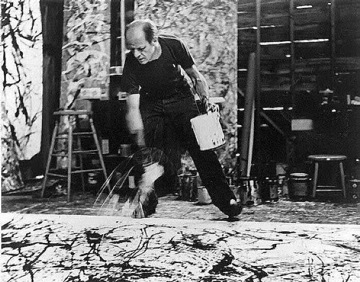 Jackson Pollock at work in his studio, photographed by Hans Namuth, 1950. 