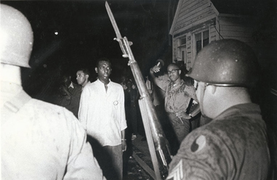 Danny Lyon (born 1942), Stokely Carmichael, Confrontation with National Guard, Cambridge, Maryland, 1964. Gelatin silver print. Purchase with funds from Joan N. Whitcomb. Courtesy High Museum of Art.