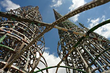 The Watts Towers, view of 99-foot tower, which contains the longest slender reinforced concrete column in the world. Courtesy www.wattstowers.us