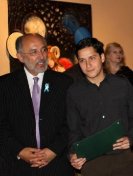 President Michael Ortiz, with student Pedro Martinez, at the Art Department's May 2010 Award Ceremony and Senior Exhibition. Image via "Fight to Save Fine Art and Art at CSU Pomona" Facebook Group.