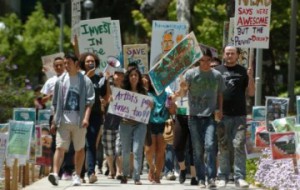 Cal Poly Pomona students and staff march to the CLA building as they respond in an uproar to last weeks recommendations to cut the fine arts program at the school May 4, 2010. Image Via The Inland Valley Daily Bulletin.