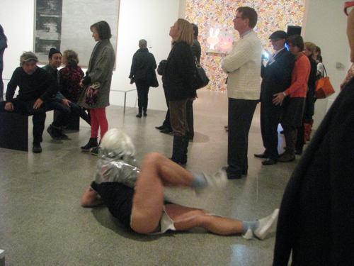 Gutierrez undresses performing an excerpt of "Retrospective Exhibitionist" Image courtesy of The Metropolitan Museum of Art.