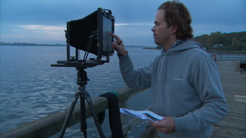 Florian Maier-Aichen takes photographs in Stralsund, Germany, 2008. Production still from the Art in the Twenty-First Century"Season 5 episode, Fantasy, 2009. © Art21, Inc. 2009.