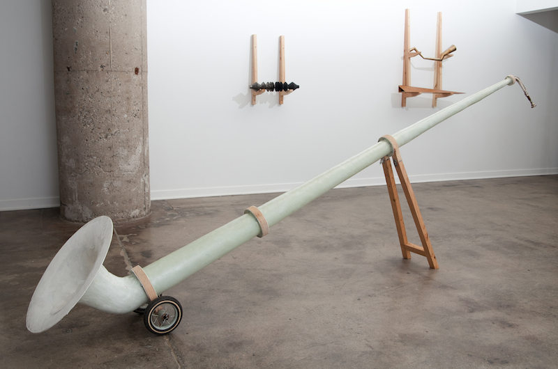WISHING FOR MOUNTAINS (SUPPER’S READY!) 2013,  Fiberglass, wood, found horn parts, wheels My take on the alphorn, suited for urban environments