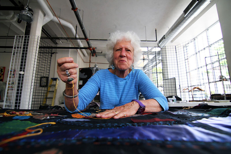 Clara Wainwright works on the Mending Boston collage quilt, 2013. Photo: PD Rosso