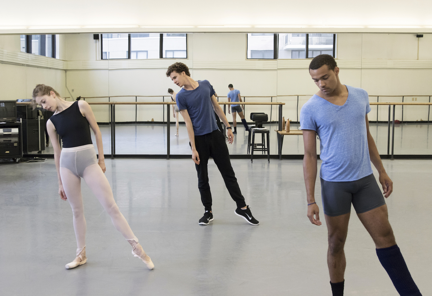 Robert Binet in rehearsal with Rebecca Krohn and Preston Chamblee, New York City Ballet. Photo by Paul Kolnik.