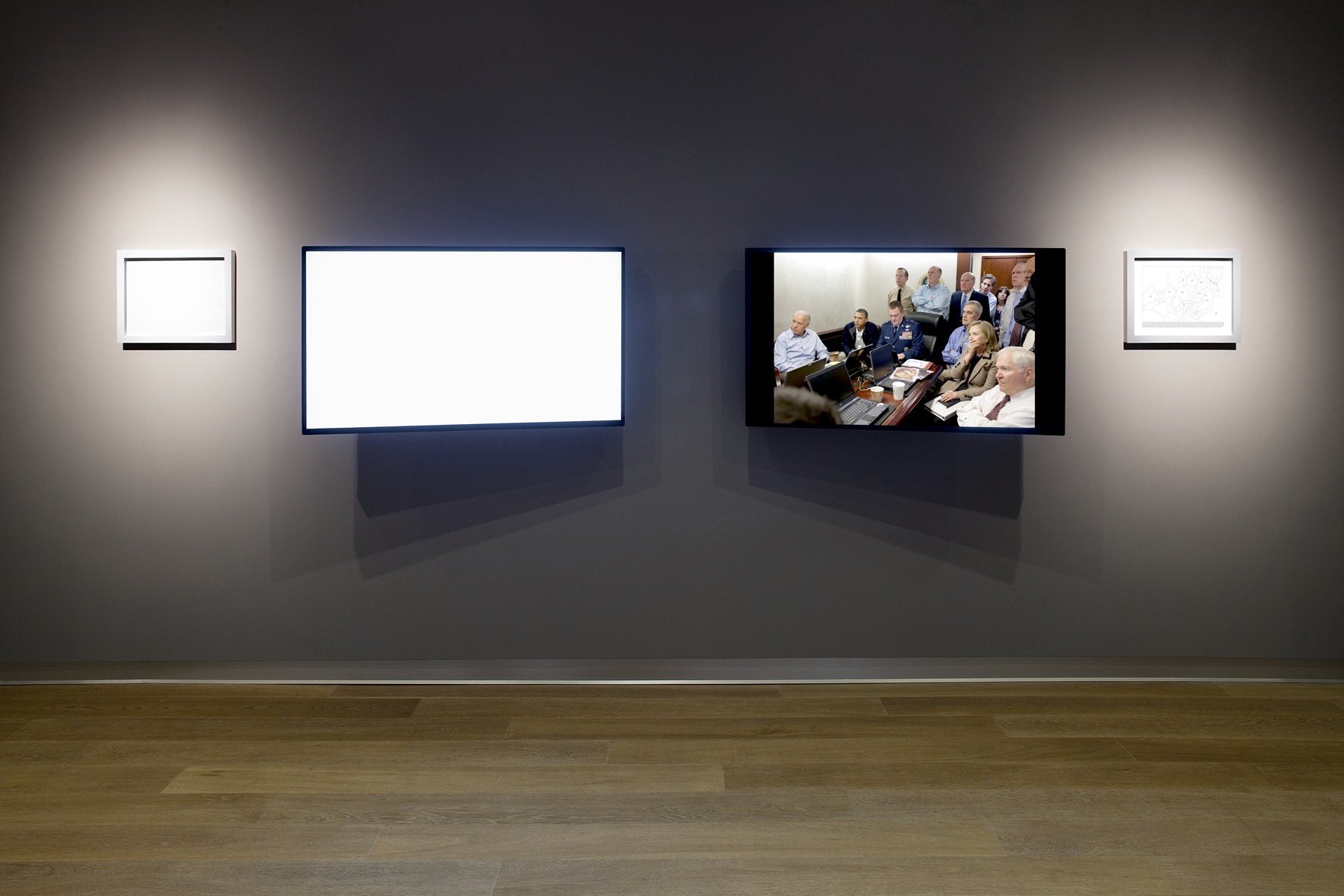 Alfredo Jaar. May 1, 2011, 2011. Two LCD monitors and two framed prints. Original White House photograph by Pete Souza. Photo by Frazer Spowart. Courtesy of the artist and Galerie Lelong, kamel mennour, Galerie Thomas Schulte.