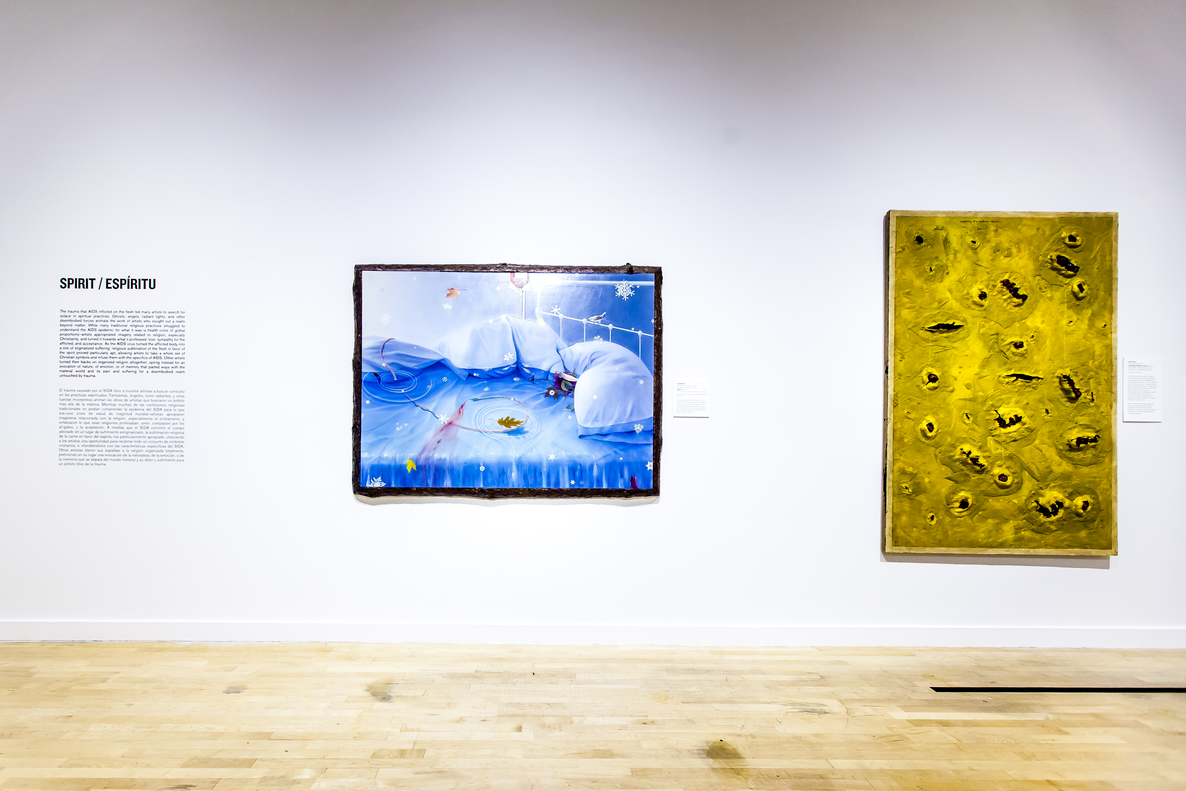 Installation view of Art AIDS America ©Marisol Díaz, 2016. Right: Izhar Patkin. Unveiling of a Modern Chastity, 1981. Rubber, latex, and ink on canvas.