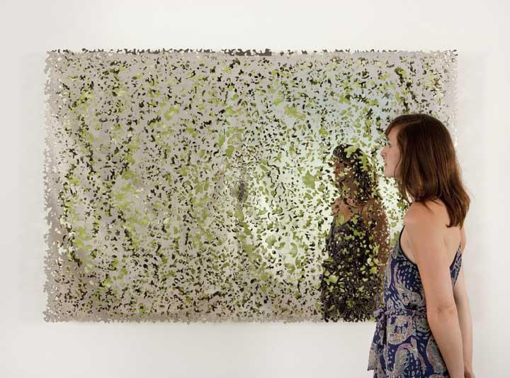 Blind Land (Green Mirror), 2013. Two layers of polished precision-cut stainless steel, 46.5 x 70.5 inches. Courtesy the artist, and Lehmann Maupin, New York and Hong Kong.