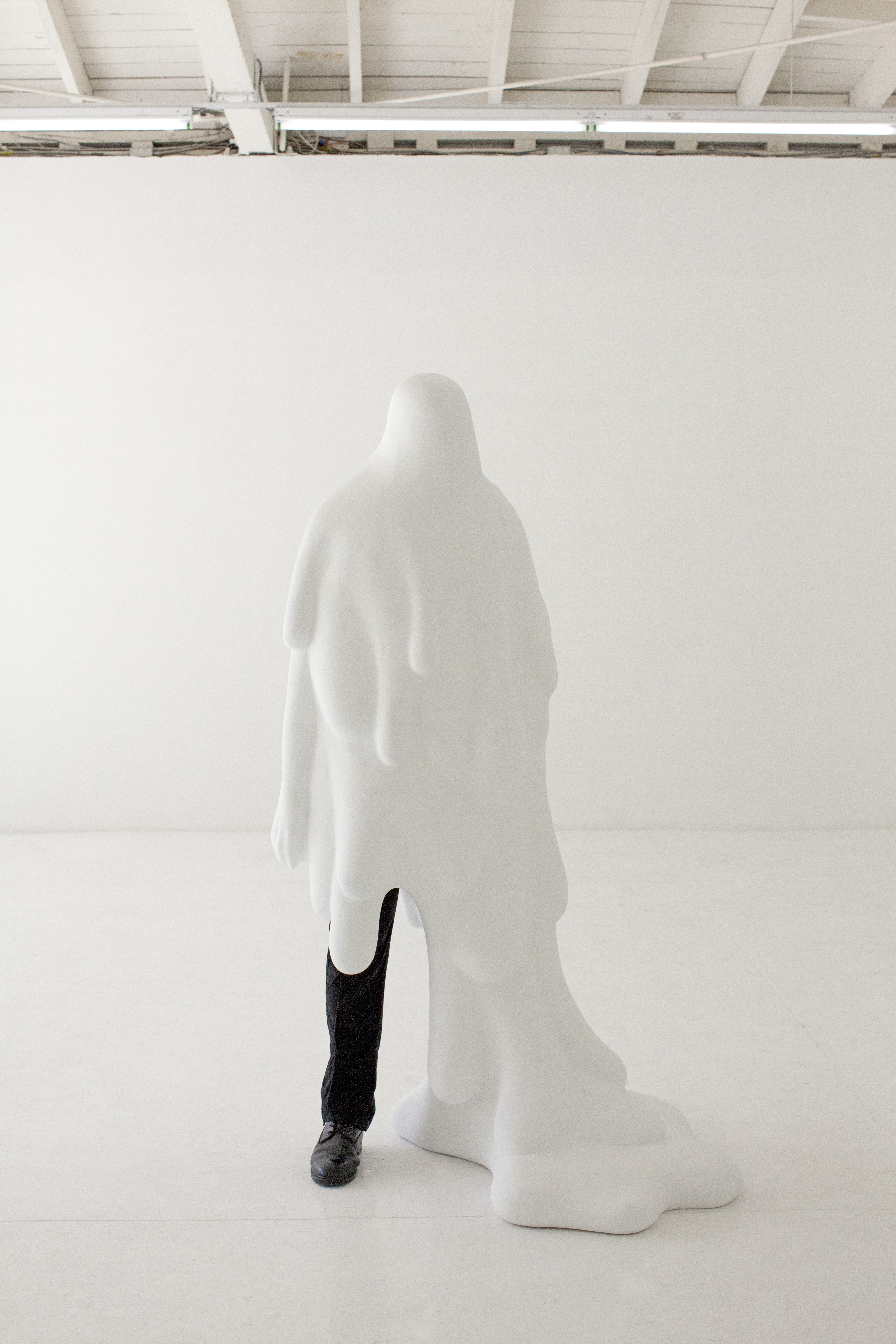 Daniel Arsham. Standing Figure with Drip, 2011, Fiberglass, paint, joint compound, mannequin, fabric, and shoe , 67 x 36 x 36 in. Courtesy of Moran Bondaroff.