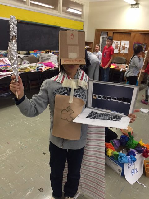 Sixth, seventh, and eighth graders invent "Apple Man" during a TASK. Courtesy of the author.
